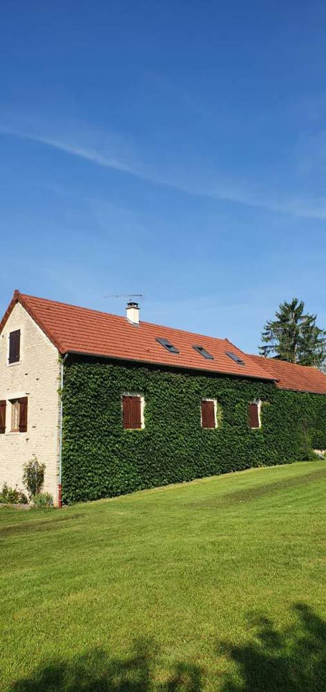 Maison ancienne avec toiture rénovée